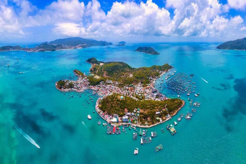 Aerial View of Nha Trang Islands and Con Se Tre Island Drone aerial shot showing Con Se Tre Island and neighboring Nha Trang islands with boats