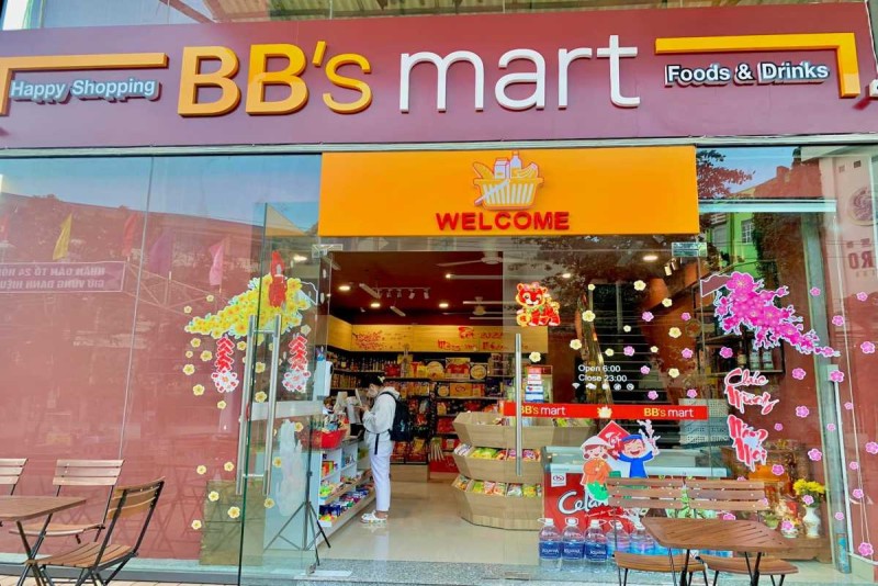 BB's Mart Convenience Store in Nha Trang BB's Mart storefront in Nha Trang offering groceries, snacks, and beverages with bright welcoming signage