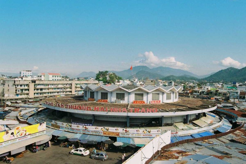 Dam Market Nha Trang Aerial View and Market Layout Aerial view of Dam Market in Nha Trang showing the circular market building surrounded by stalls and cityscape
