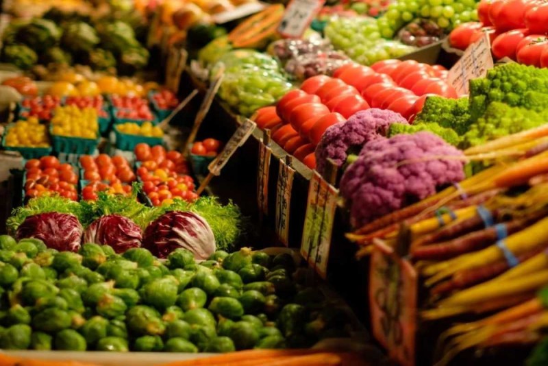 Dam Market Nha Trang Fresh Produce Display Fresh vibrant vegetables and fruits displayed at Dam Market Nha Trang with rich colors