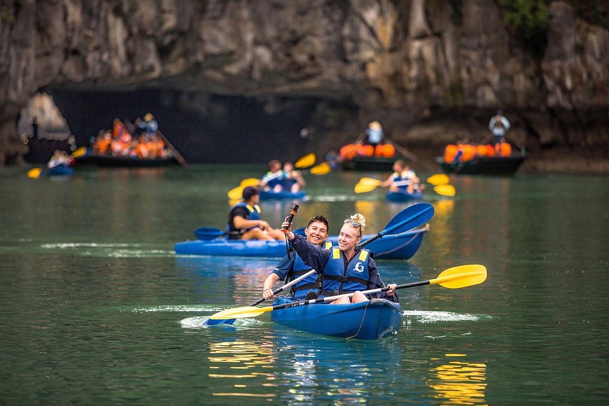 Kayaking in Cua Van Fishing Village with serene landscapes