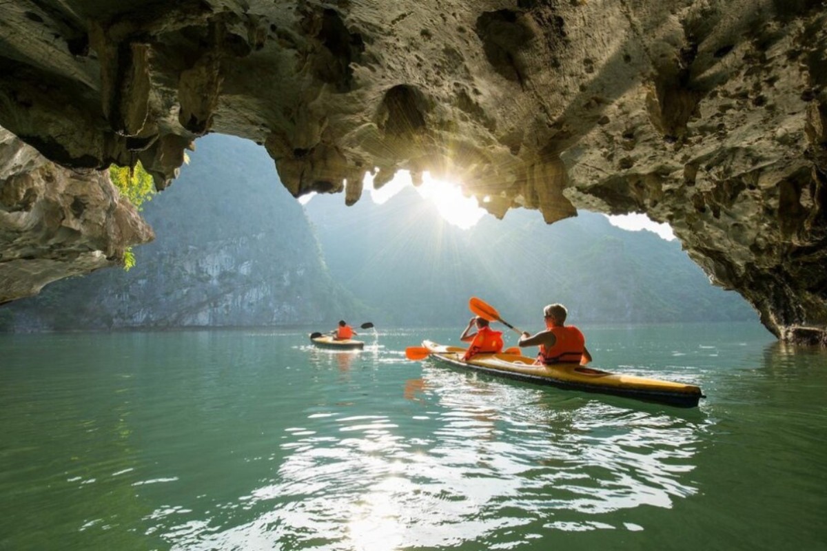 A scenic view of kayaking in Trinh Nu Cave