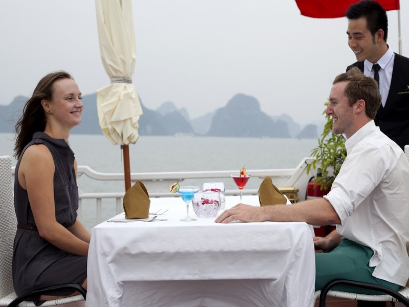 Vibrant sunset view over Halong Bay's waters