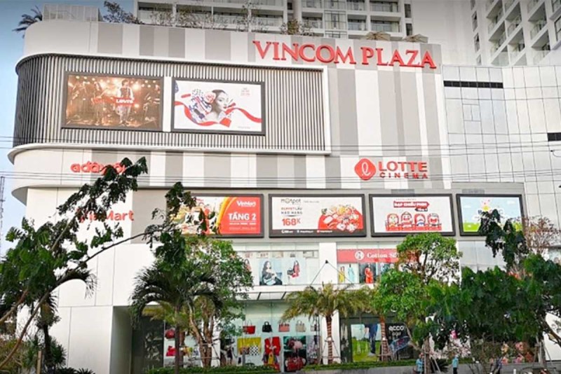 Vincom Plaza Nha Trang Modern Shopping Mall Exterior Vincom Plaza Nha Trang modern shopping mall facade featuring brand advertisements and inviting entrance