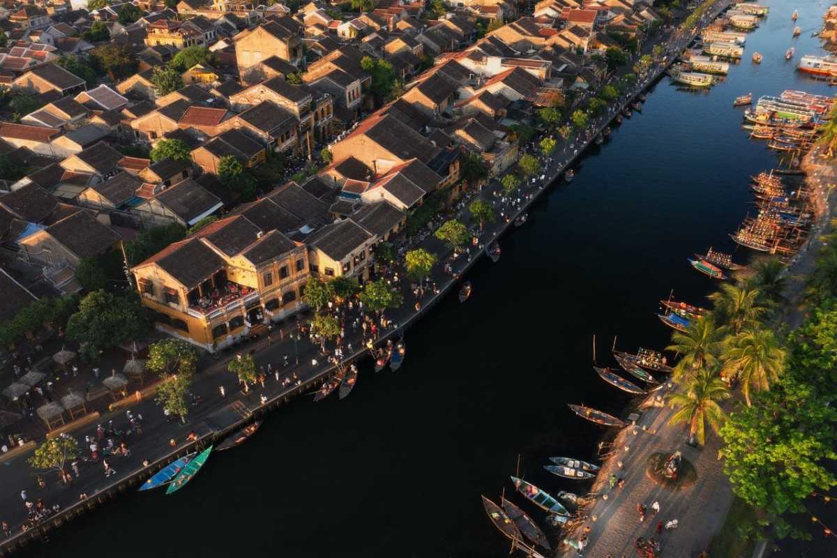 Aerial View of Hoi An Ancient Town and Japanese Bridge Aerial shot of Hoi An Ancient Town with the Japanese Bridge Hoi An crossing over the river.