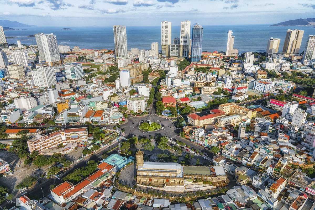 Panoramic Hilltop Shot of the Cathedral Aerial view of Nha Trang Mountain Church surrounded by the city and backed by distant mountains