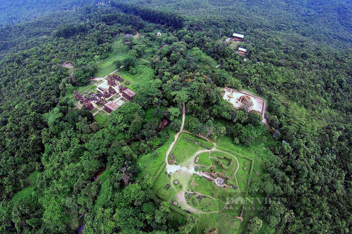 Aerial View of My Son Sanctuary Complex Drone shot capturing the entire My Son Sanctuary archaeological site amid dense forest and hills in Central Vietnam