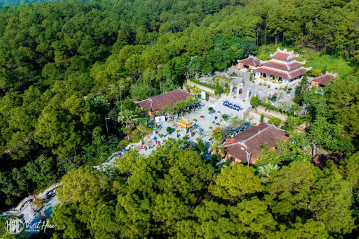 Aerial view of Huyen Tran Princess Temple surrounded by pine forests on Ngu Phong Mountain in Hue