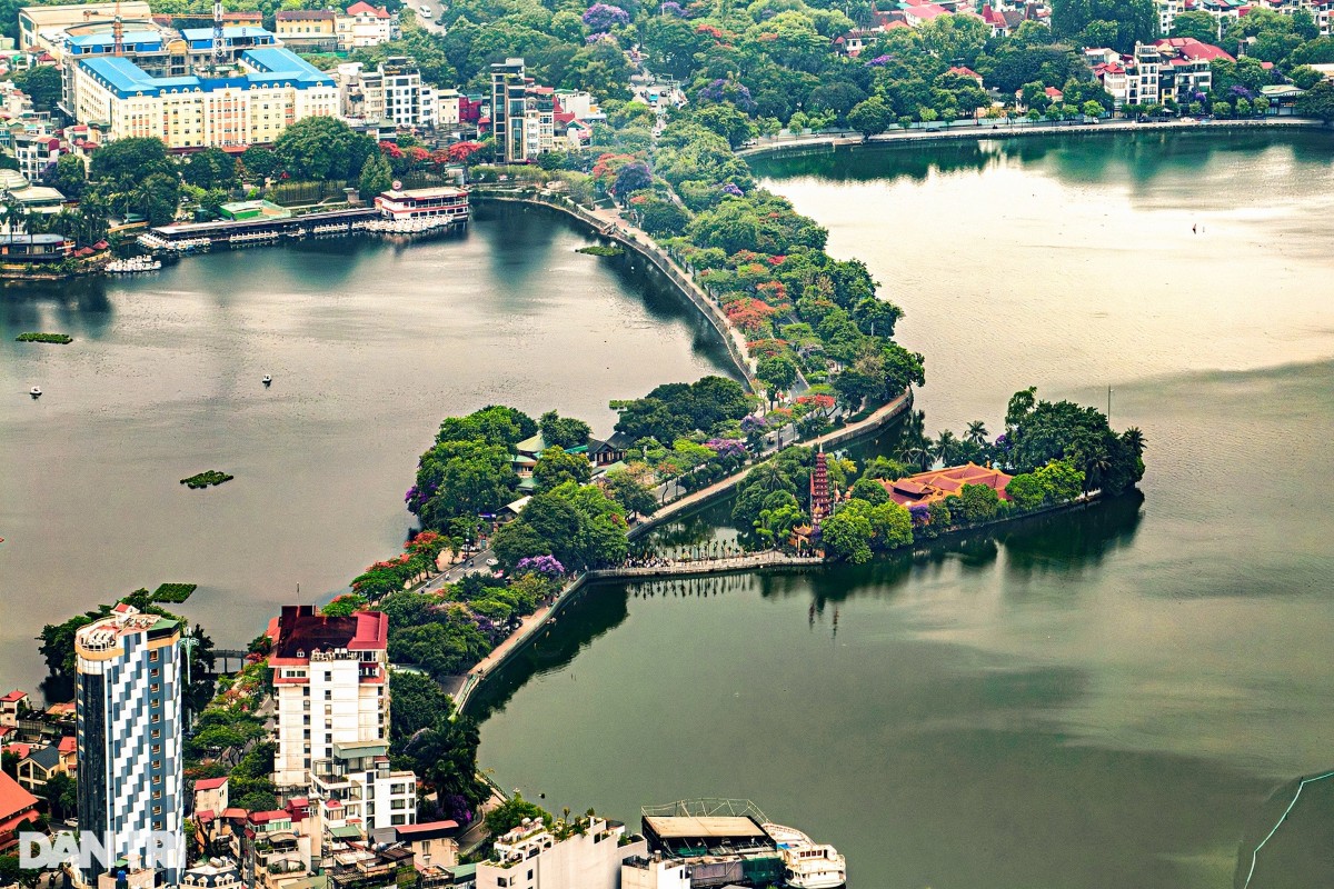 Aerial view of Truc Bach Lake in Hanoi, featuring lush greenery and urban surroundings