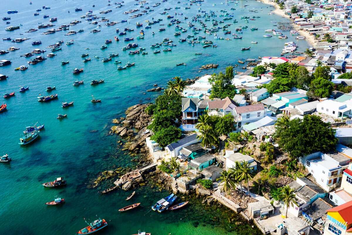 An Thoi Archipelago harbor aerial view Aerial view of An Thoi Archipelago harbor with boats and coastal village, showing clear waters