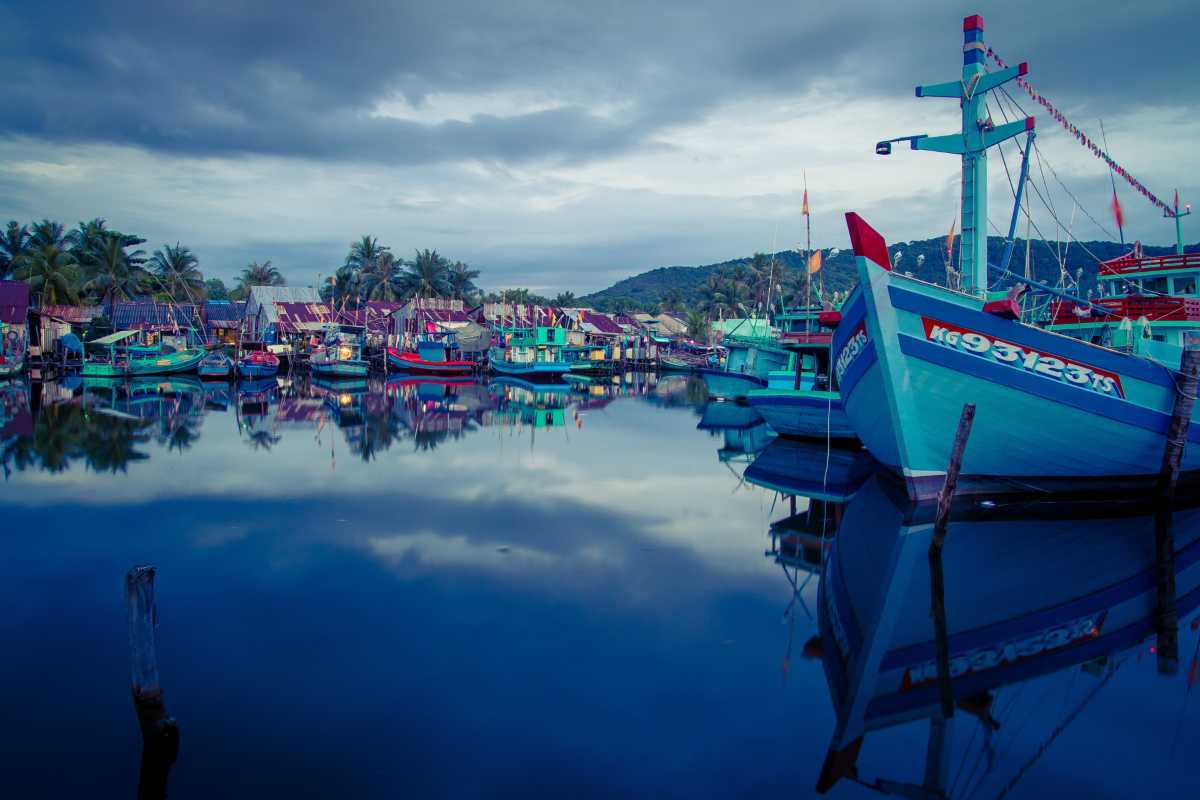 Colorful fishing boats docked at An Thoi Harbor reflecting the traditional fishing village atmosphere in Phu Quoc Island