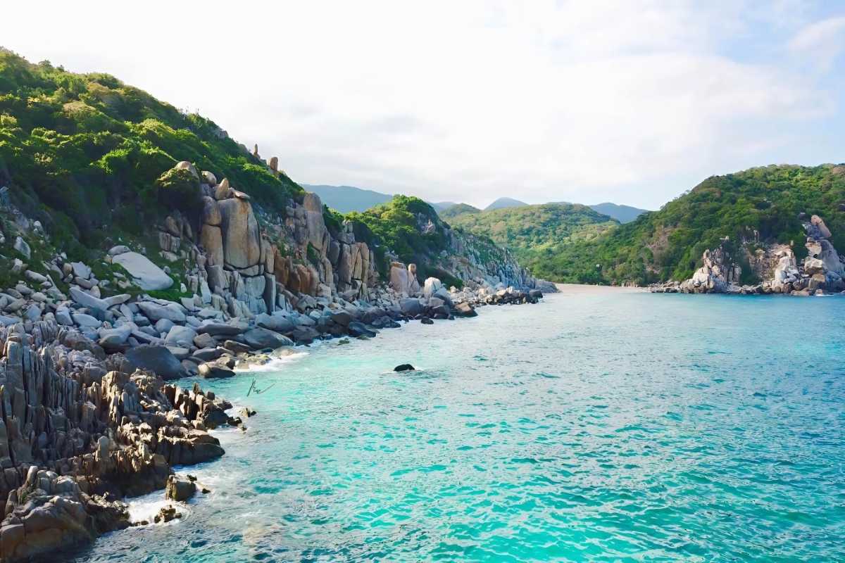 Ba Dien Beach Coastal Green Hills Coastal green hills and rocky shore at Ba Dien Beach, Ninh Thuan