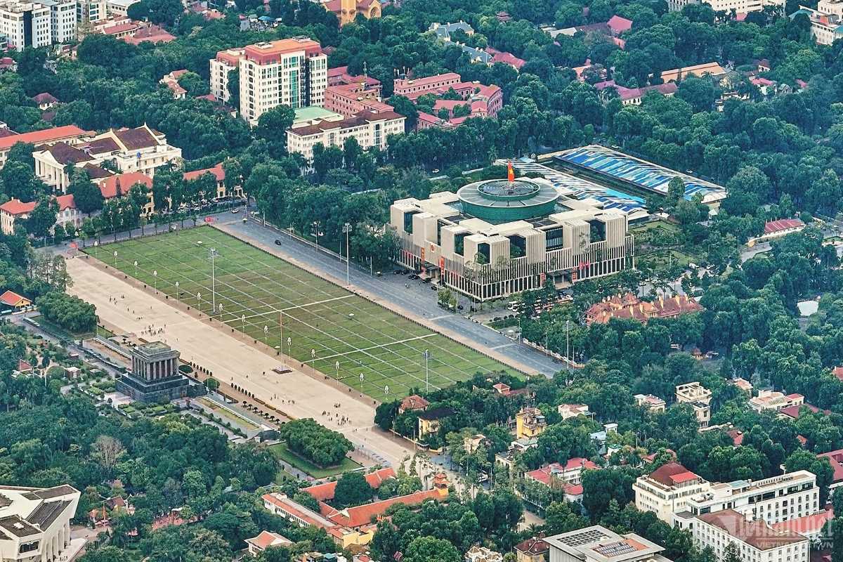 Ba Dinh Square Hanoi - Green Fields with Ho Chi Minh Mausoleum The well-maintained grassy areas of Ba Dinh Square Hanoi, with the Ho Chi Minh Mausoleum standing proudly in the background.
