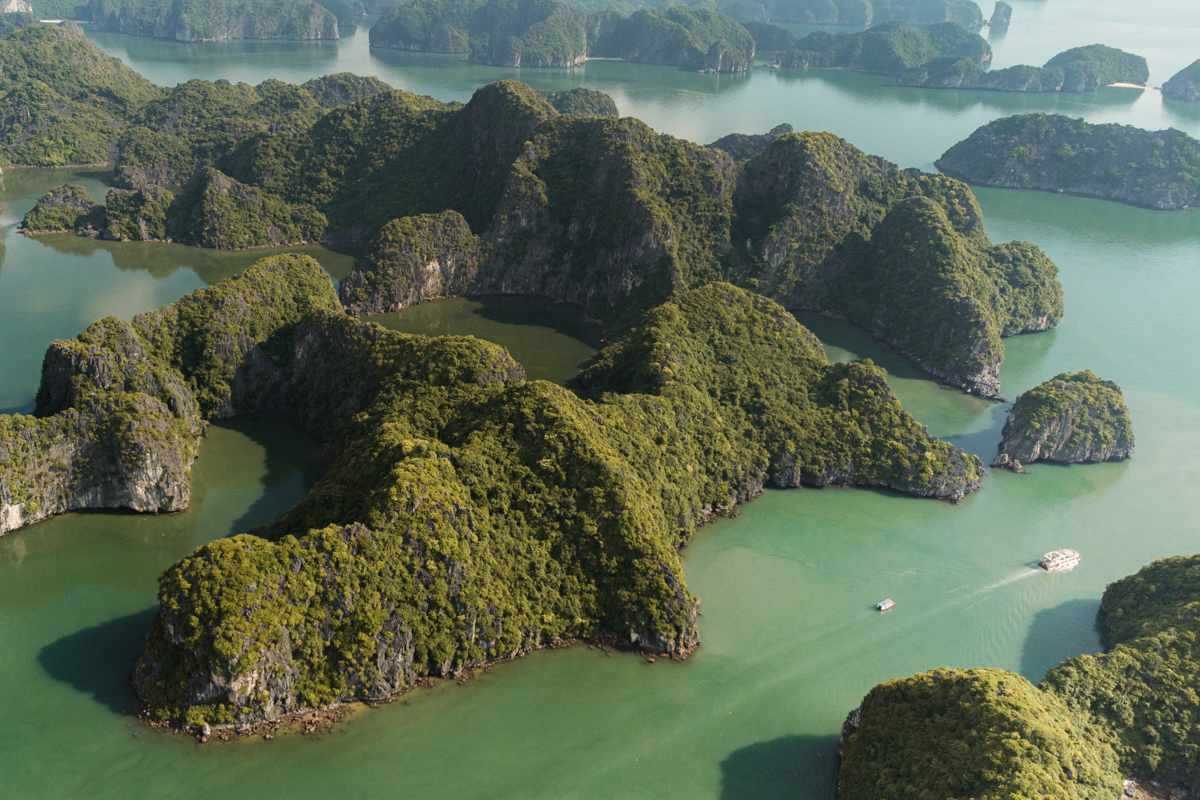 Ba Ham Lake Halong Bay Aerial View of Limestone Formations and Lake Aerial view capturing limestone karsts and clear waters of Ba Ham Lake Halong Bay