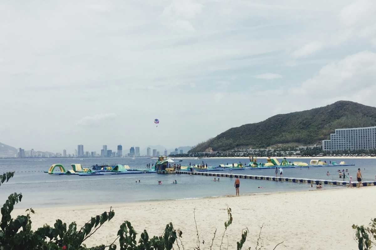 Floating water park with inflatables on Bai Dai Beach Nha Trang, perfect for fun water activities.