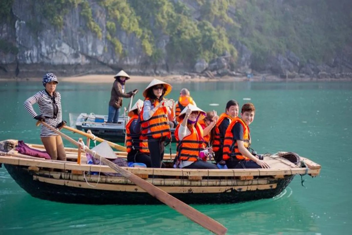 Bamboo boat ride at Tung Sau Pearl Farm in Halong Bay