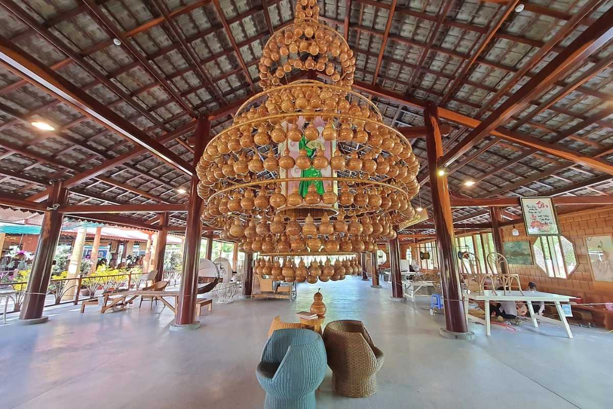 Bamboo Lantern Display at Craft Center Massive bamboo lantern chandelier on display inside a craft village hall along the Cai River in Nha Trang.