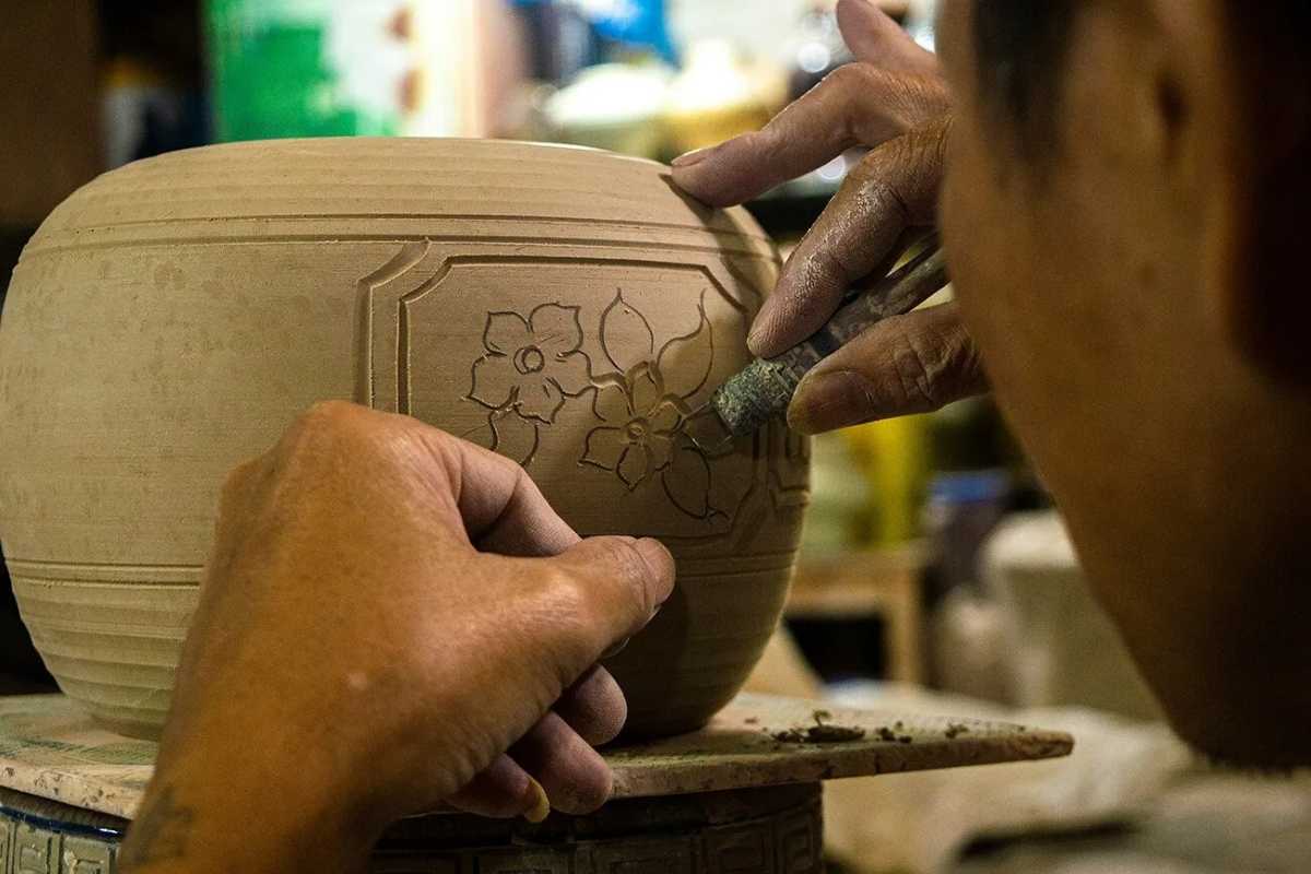 Bat Trang Ceramic Village Finished Ceramics Display Colorful finished ceramic bowls, plates, and teapots displayed in Bat Trang Ceramic Village