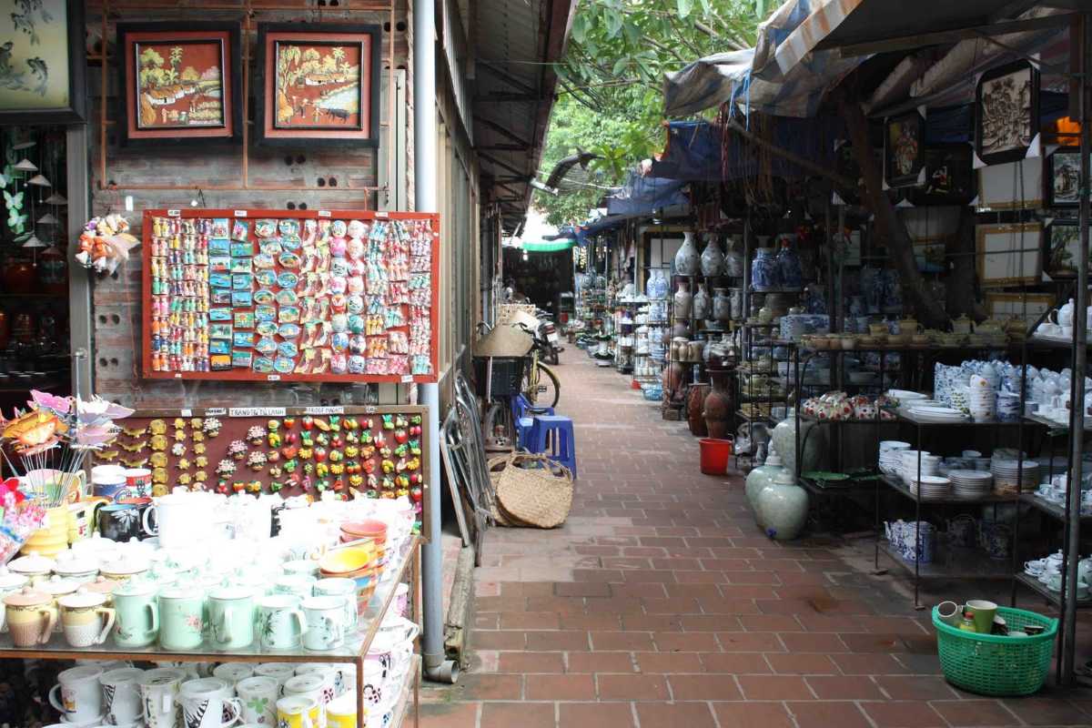 Bat Trang Ceramic Village Clay Pot Drying Area Large outdoor drying area with numerous clay pots arranged neatly at Bat Trang Ceramic Village pottery workshop