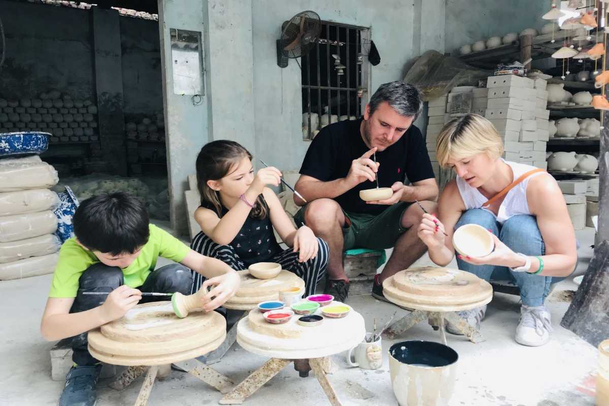 Bat Trang Ceramic Village Pottery Display and Workshop Indoor pottery display and workshop area at Bat Trang Ceramic Village filled with various ceramic items