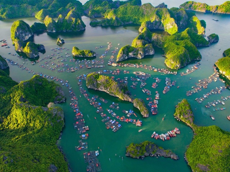 Cat Ba Island clear blue waters with a scenic backdrop