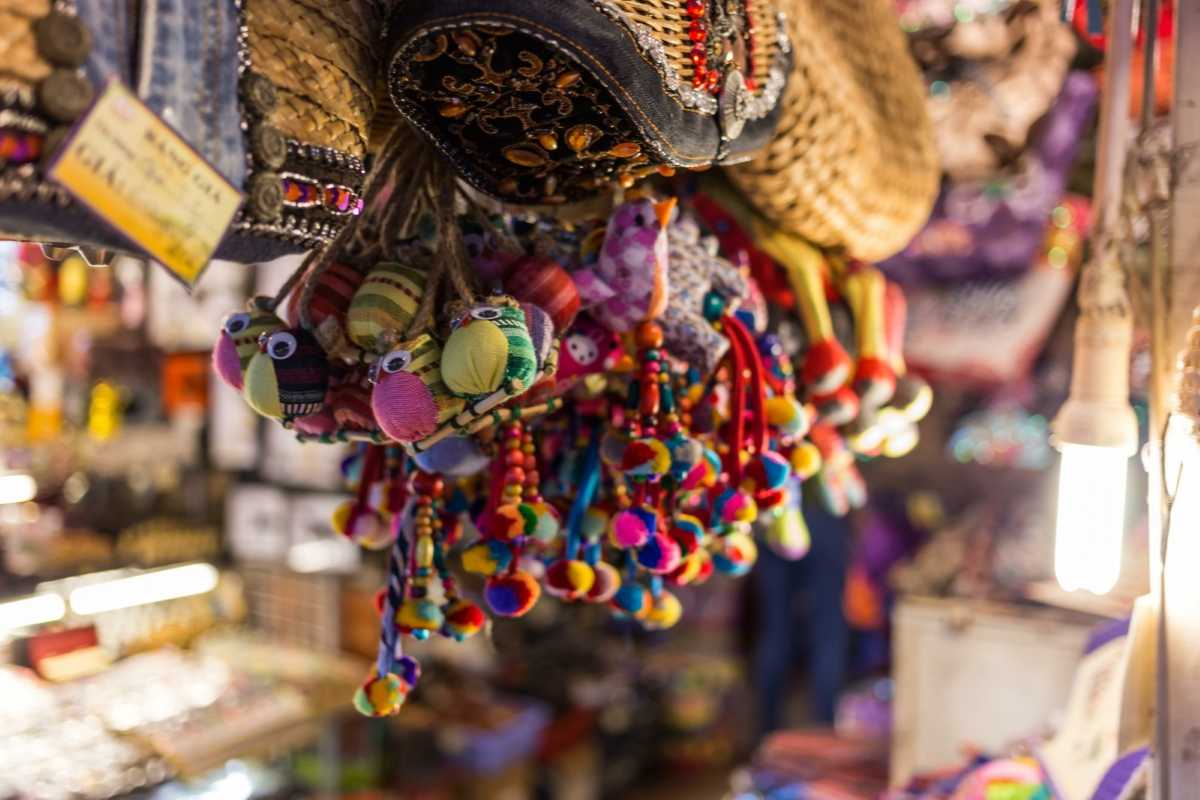 Ben Thanh Market souvenir and food stalls busy shopping area Busy shopping area of souvenir and food stalls inside Ben Thanh Market filled with visitors
