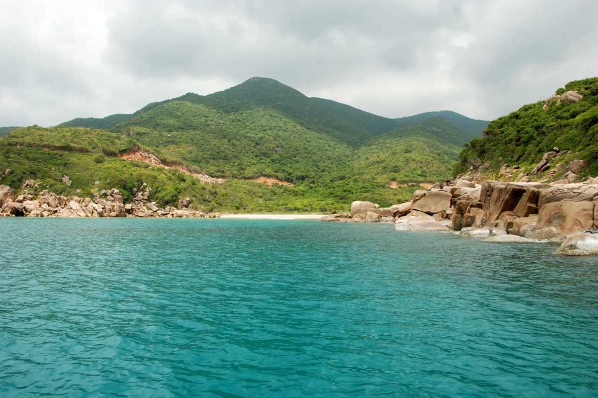 Crystal Clear Water and Rocky Coastline at Binh Tien Beach Clear turquoise waters and rocky coastline at Binh Tien Beach, Ninh Thuận