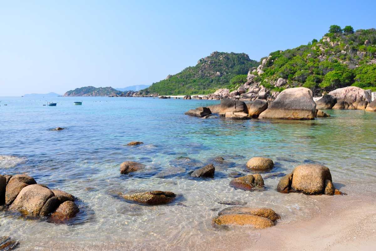 Rocky Shore and Clear Water at Binh Tien Beach Close-up of rocky shore with clear water at Binh Tien Beach, Ninh Thuận