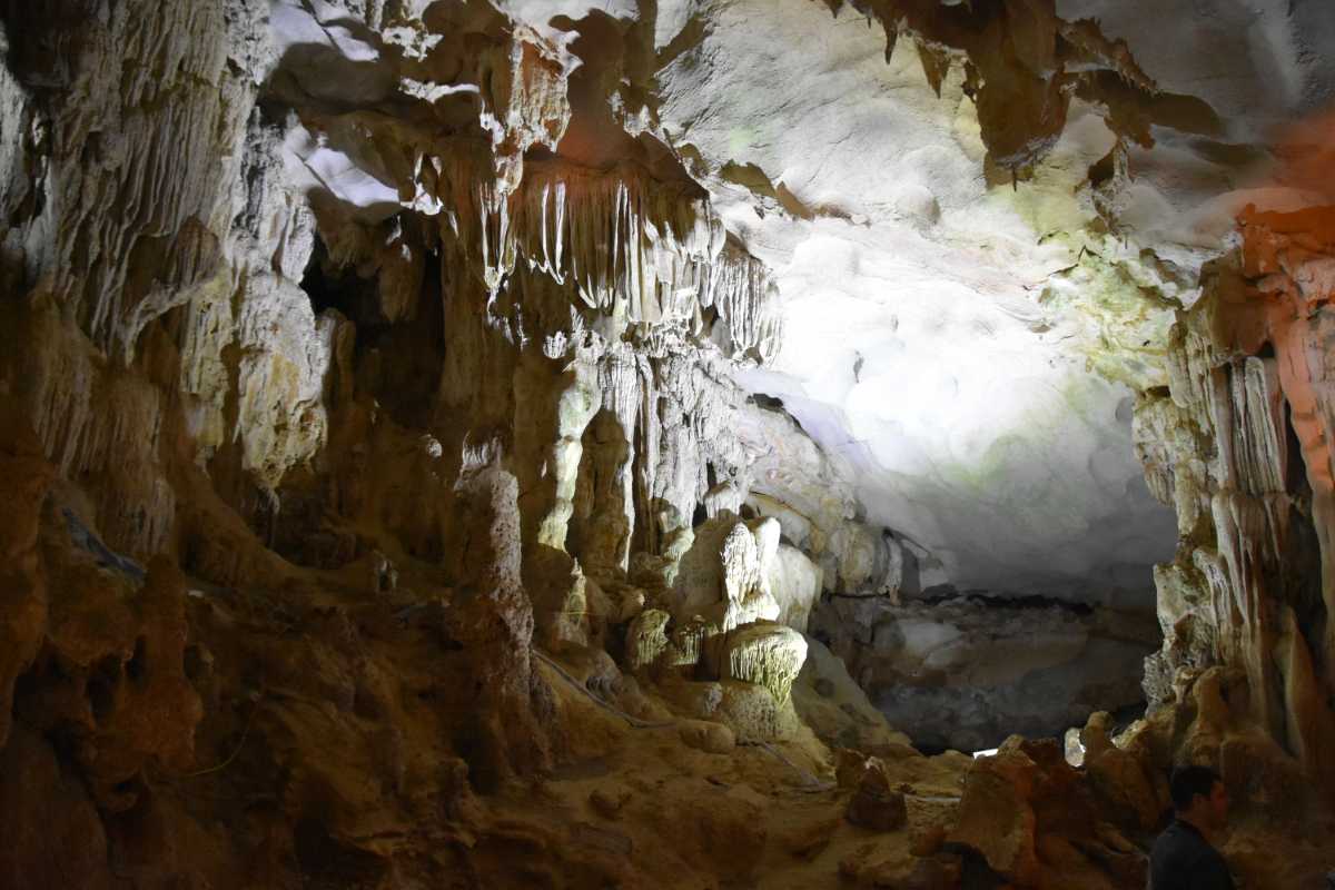 Bo Nau Cave Halong Bay cave interior stalactites and formations Inside Bo Nau Cave, with illuminated stalactites and rock formations creating a natural wonder.