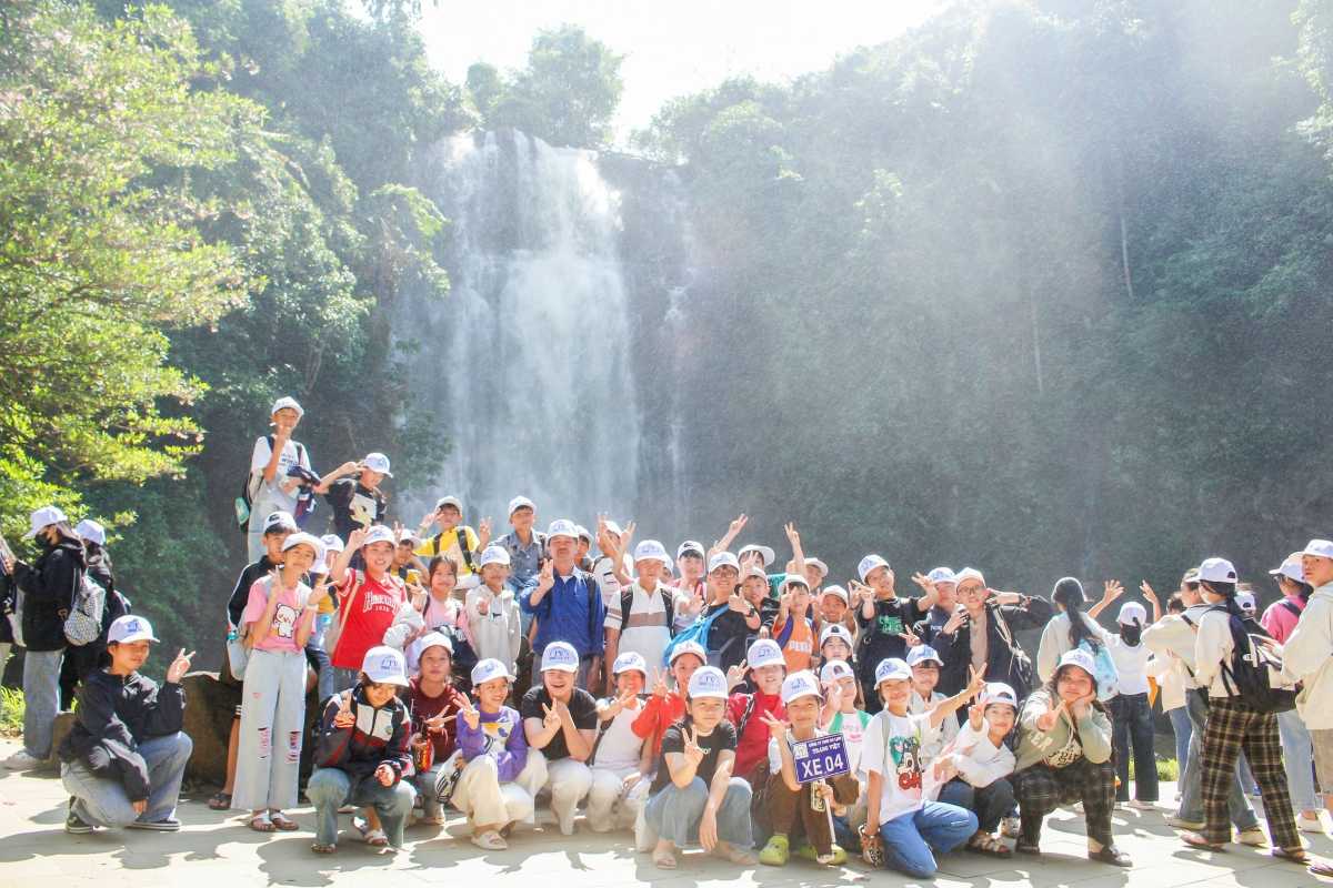 Bobla Waterfall Da Lat large group of visitors at falls Large group of tourists gathered near Bobla Waterfall Da Lat enjoying the waterfall scenery and nature