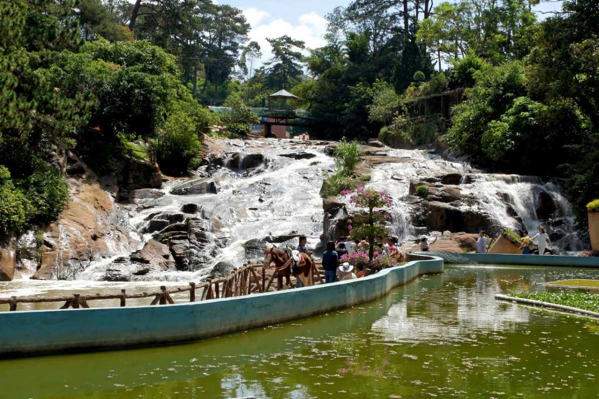 Cam Ly Waterfall Da Lat natural cascade and river Cam Ly Waterfall Da Lat flowing natural cascade connecting to river surrounded by greenery