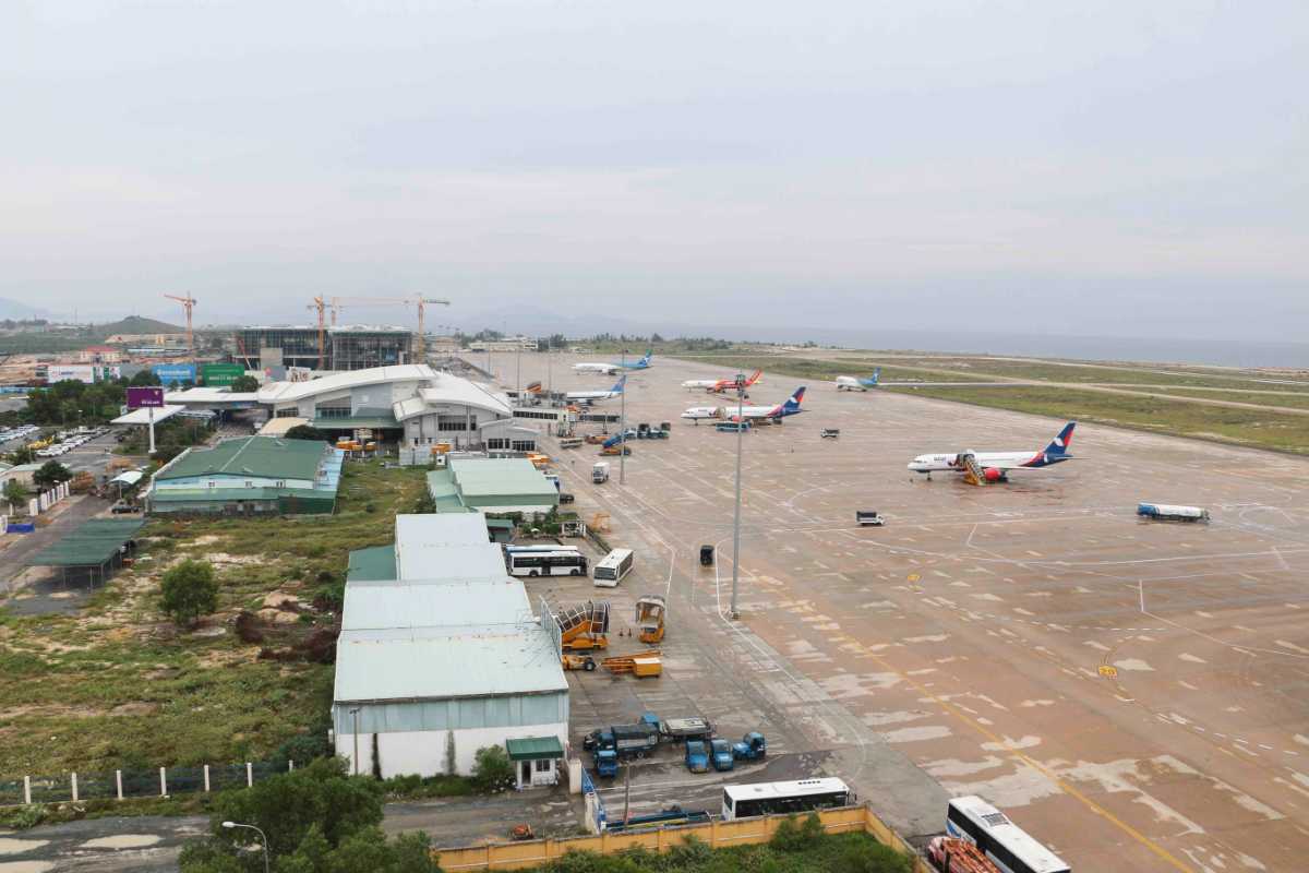 Cam Ranh International Airport Parking Area Wide shot of vehicle parking lots in front of Cam Ranh International Airport terminal
