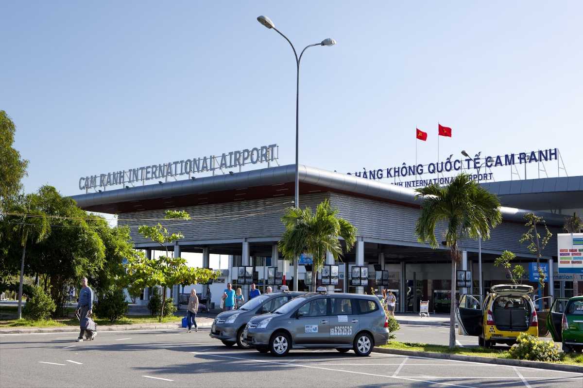 Cam Ranh International Airport Terminal and Taxi Area Entrance to Cam Ranh International Airport with taxis waiting for passengers