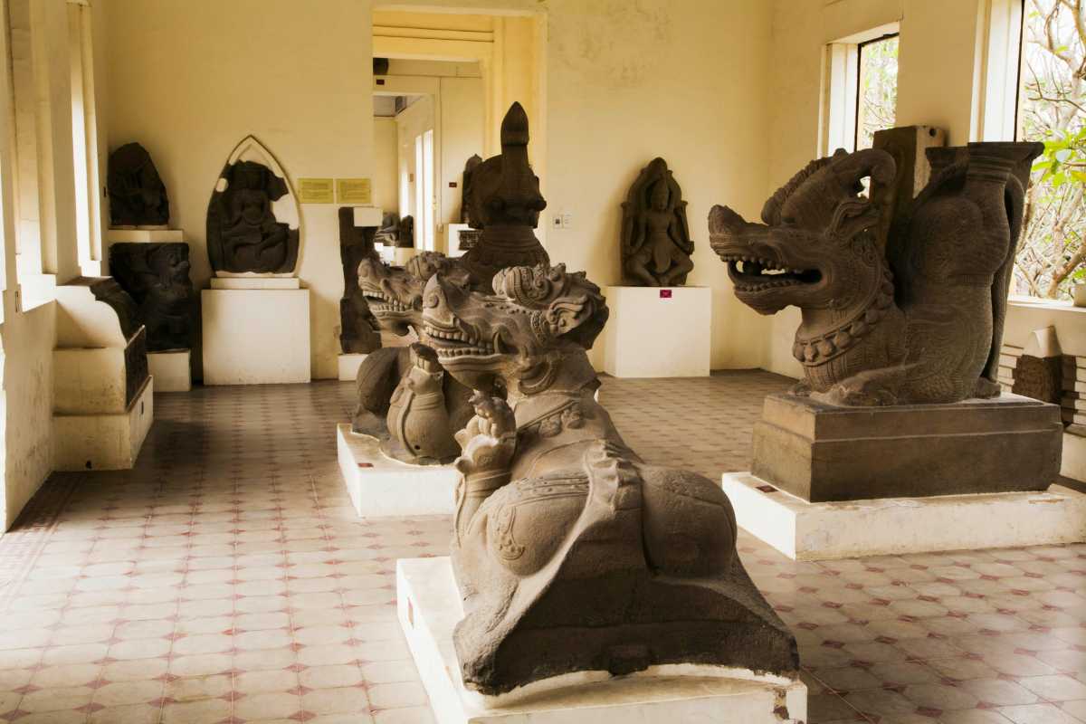 Cham Sculpture Museum Da Nang ancient lion sculptures gallery Cham Sculpture Museum Da Nang features ancient lion guardian sculptures and intricate stone artifacts in a bright historical room