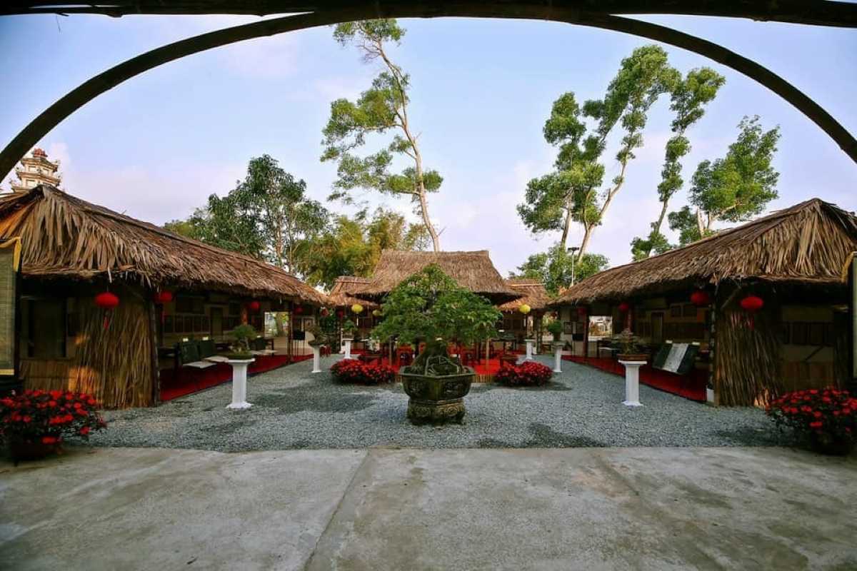 Bamboo Structure and Exhibition Space at Chuc Thanh Pagoda Hoi An Traditional bamboo-roofed exhibition area showcasing artifacts and displays at Chuc Thanh Pagoda, Hoi An