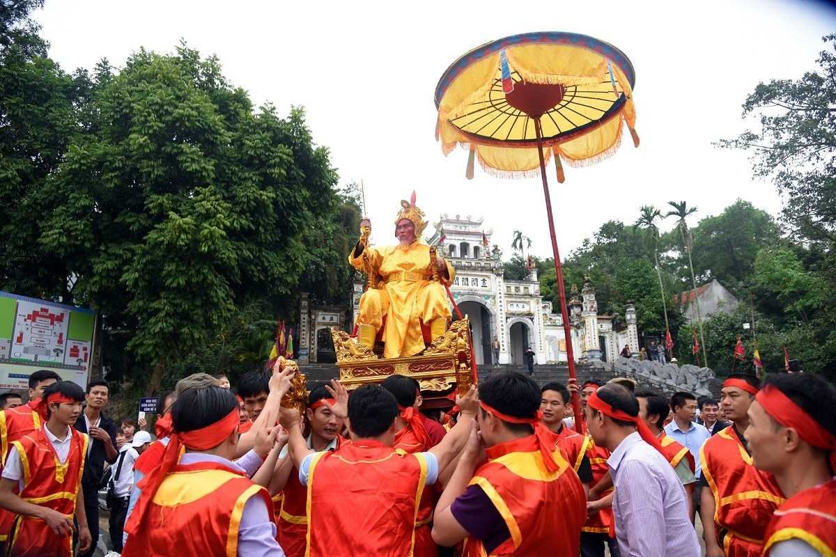 Co Loa Ancient Citadel Festival Celebration Festival procession at Co Loa Ancient Citadel with traditional costumes and cultural rituals