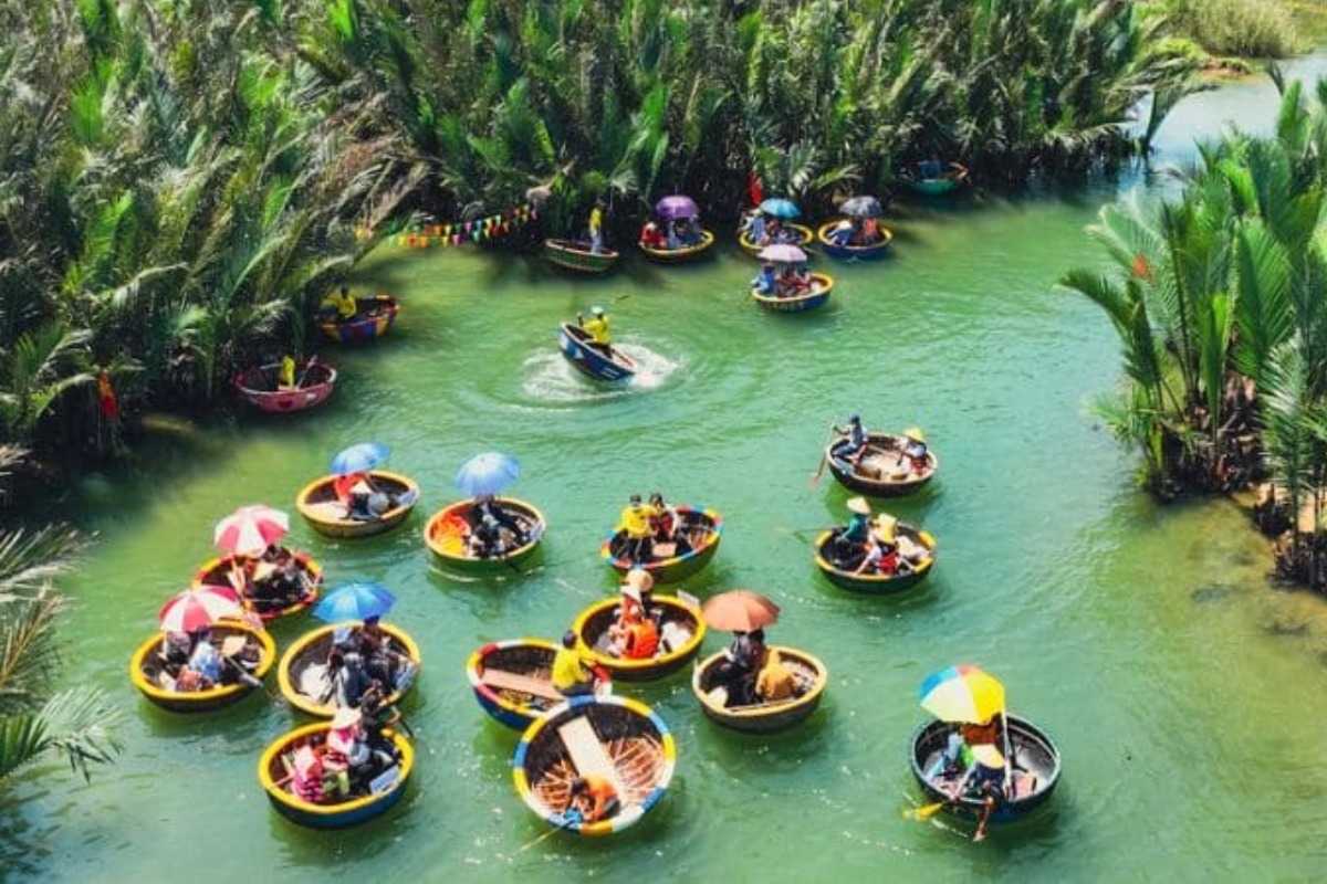 Colorful Basket Boats Gathering in Bay Mau Forest Group of colorful basket boats floating and preparing to start a ride in Bay Mau Coconut Forest