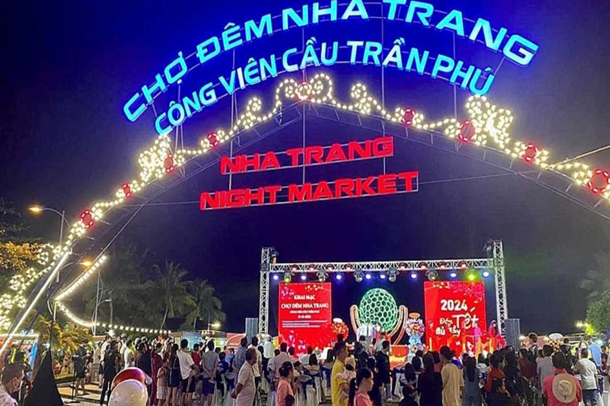 Colorful Lantern Rows at Nha Trang Night Market Multiple rows of red, yellow, and green lanterns hang above vendors at Nha Trang Night Market