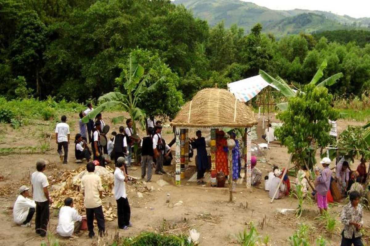 Minority community gathering Ethnic villagers gather at a small shrine for a community ceremony in the countryside near Nha Trang.