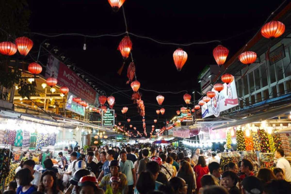 Crowded Market Walkway at Night Crowds of tourists and locals walking through Duong Dong Night Market at night
