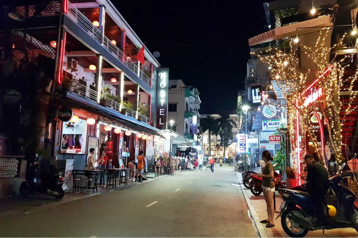 Crowded Night Market on Nguyen Dinh Chieu Walking Street People shopping and walking through a crowded night market area on Nguyen Dinh Chieu Walking Street