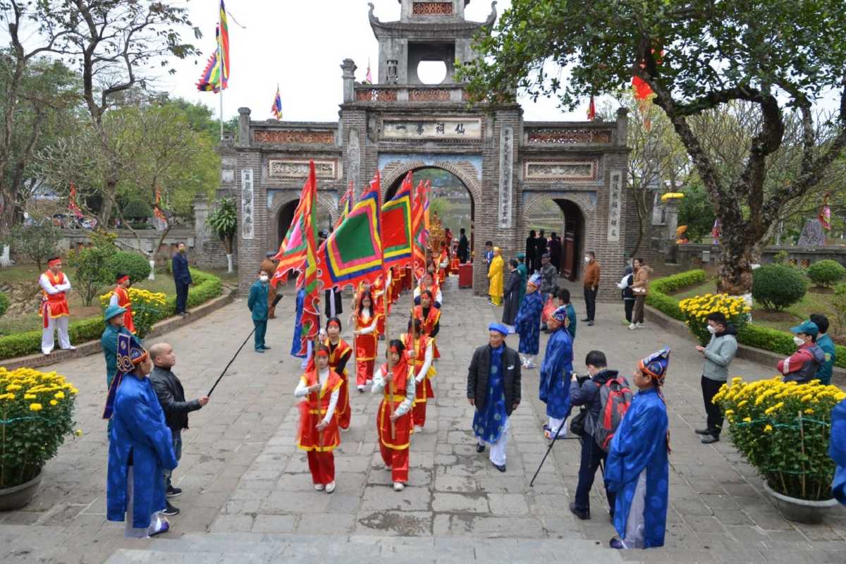 Cultural Festival Ceremony at Co Loa Traditional cultural ceremony with participants in colorful costumes at Co Loa Ancient Citadel