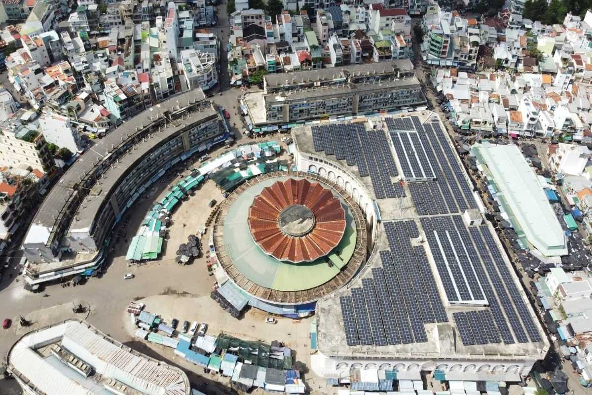 Dam Market Nha Trang aerial view showing iconic round market dome Aerial view of Dam Market Nha Trang highlighting the circular dome roof and surrounding buildings