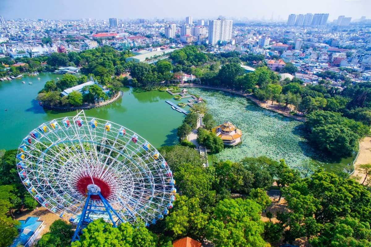 Aerial View of Dam Sen Water Park and Ferris Wheel Aerial view of Dam Sen Water Park showing the large Ferris wheel, lakes, and lush greenery