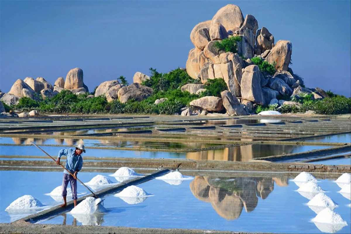 Dam Vua Salt Fields with Rock Formation Scenic rock formations behind the salt ponds at Dam Vua Salt Fields Ninh Thuan