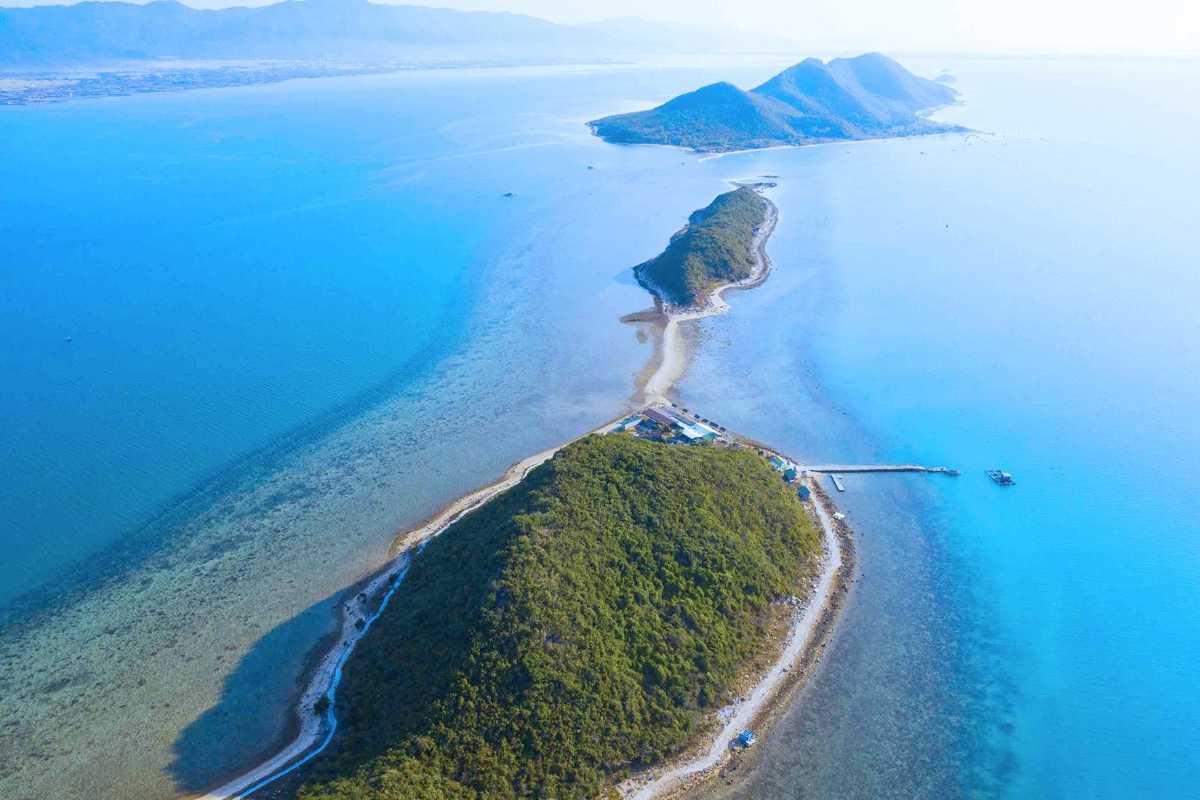 Scenic Diep Son Island and Surrounding Waters from Above Scenic aerial view of Diep Son Island and turquoise surrounding waters near Nha Trang