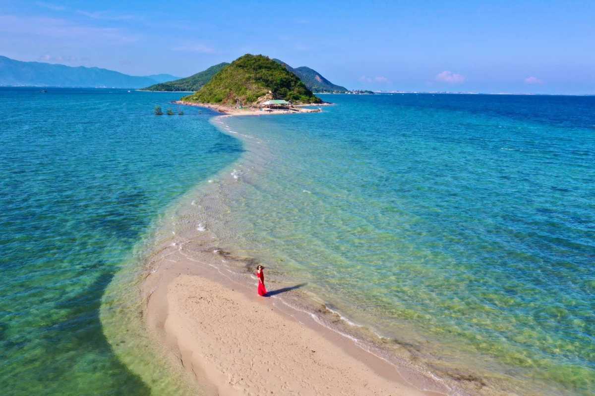 White Sand Beach and Traditional Boats on Diep Son Island Traditional round boats lined along the white sand beach at Diep Son Island Nha Trang