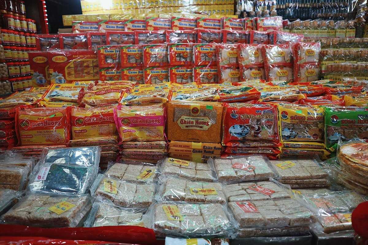 Hue Specialty Snacks and Sweets at Dong Ba Market Rows of packaged Hue specialty snacks and sweets arranged neatly at Dong Ba Market for visitors to buy