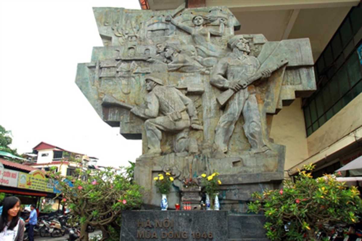 Monument Outside Dong Xuan Market Historic war memorial statue located near Dong Xuan Market in Hanoi