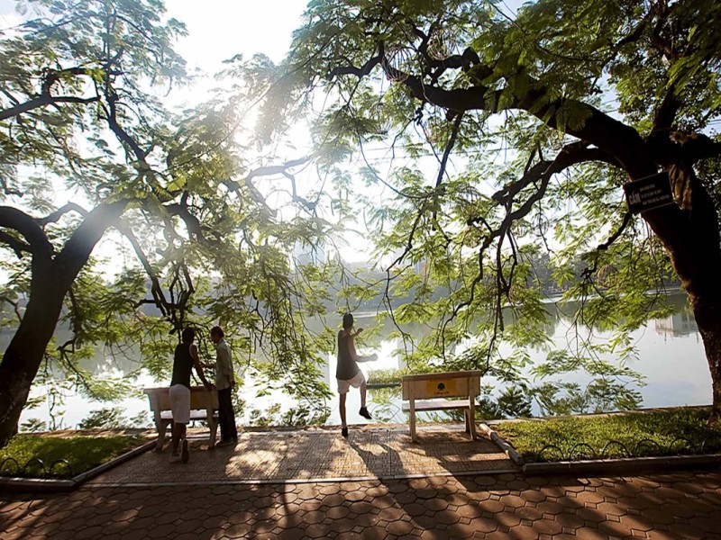 Early morning scene at Hoàn Kiếm Lake in Hanoi